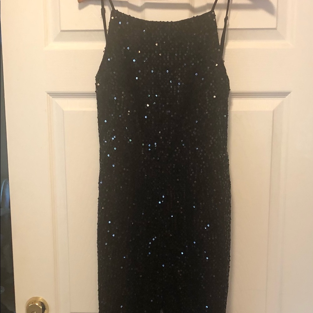New Years Eve style Black sequin one piece jumpsuit.
